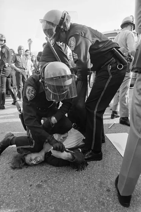 Framed Print : Police Restraining a Student Framed Print : Police Restraining a Student