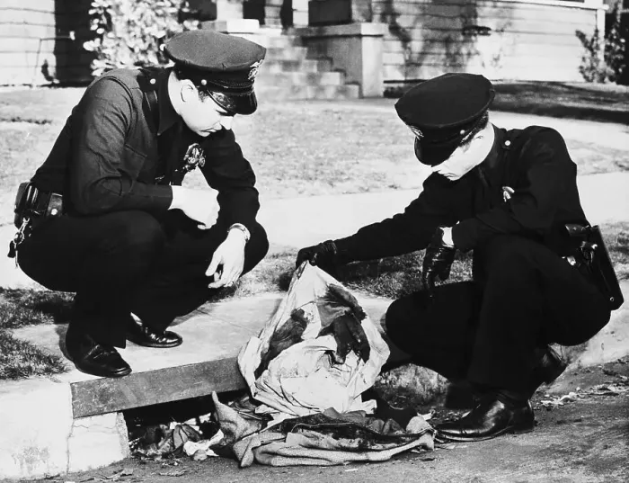 Framed Print : Police Searching Through Bloodstained Clothing Framed Print : Police Searching Through Bloodstained Clothing