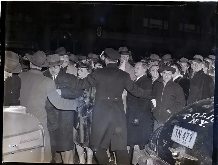 Framed Print : Policeman Directs New Year's Eve Crowd Framed Print : Policeman Directs New Year's Eve Crowd
