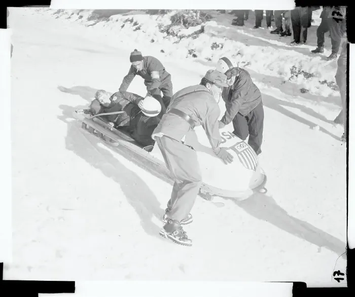 Framed Print : Policeman Helping Edgar Seymour Out of a Bobsled Framed Print : Policeman Helping Edgar Seymour Out of a Bobsled