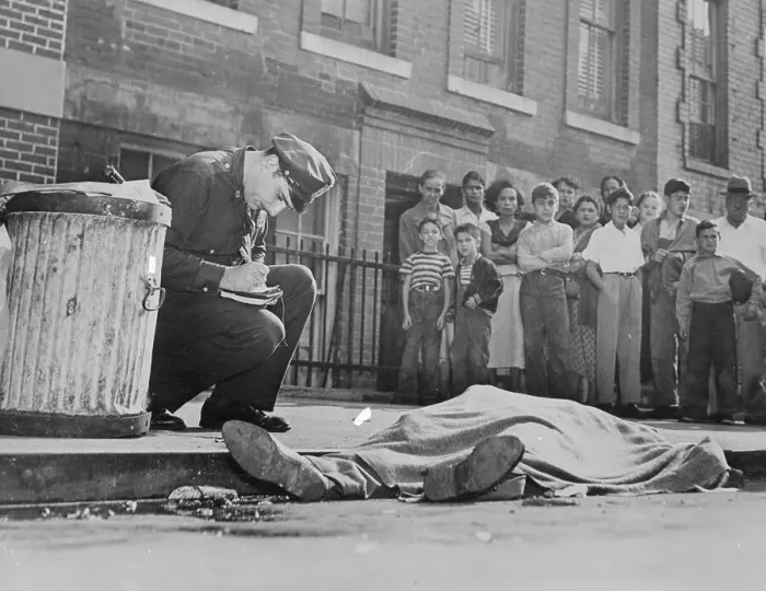 Framed Print : Policeman Inspecting a Body Framed Print : Policeman Inspecting a Body