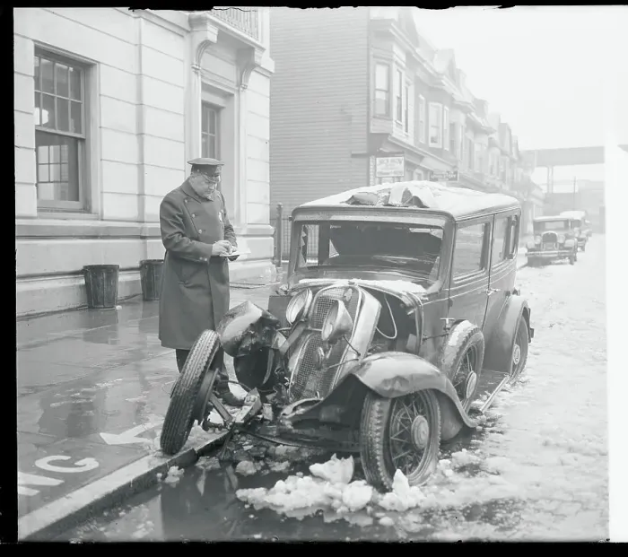 Framed Print : Policeman Inspecting a Wrecked Car Framed Print : Policeman Inspecting a Wrecked Car