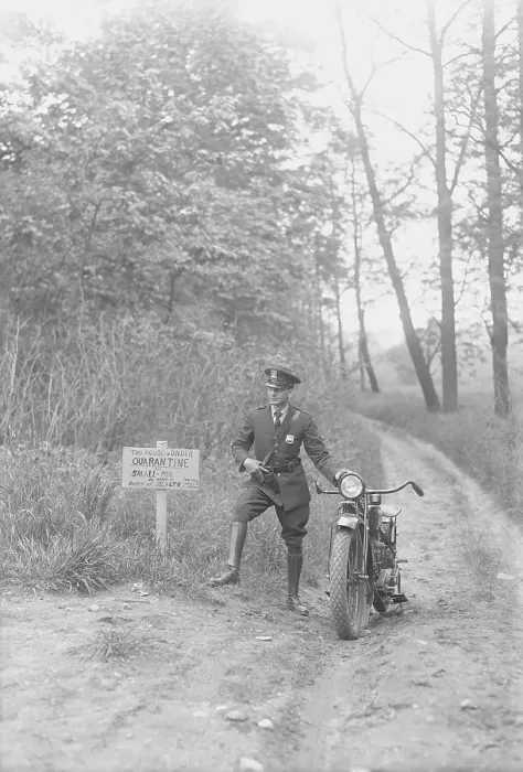 Framed Print : Policeman Pausing by His Motorcycle at Posted Sign Framed Print : Policeman Pausing by His Motorcycle at Posted Sign