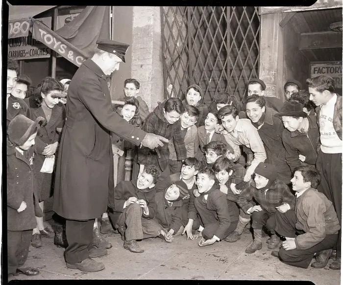 Framed Print : Policeman Reprimands Young Dice Players Framed Print : Policeman Reprimands Young Dice Players