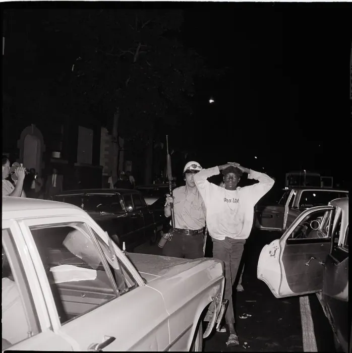 Framed Print : Policeman Taking a Rioter Away Framed Print : Policeman Taking a Rioter Away