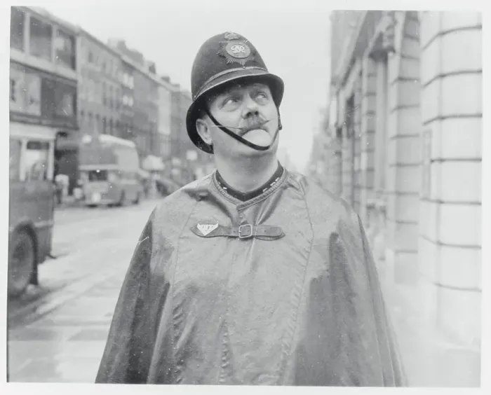 Framed Print : Policeman Wearing Rain Attire Framed Print : Policeman Wearing Rain Attire