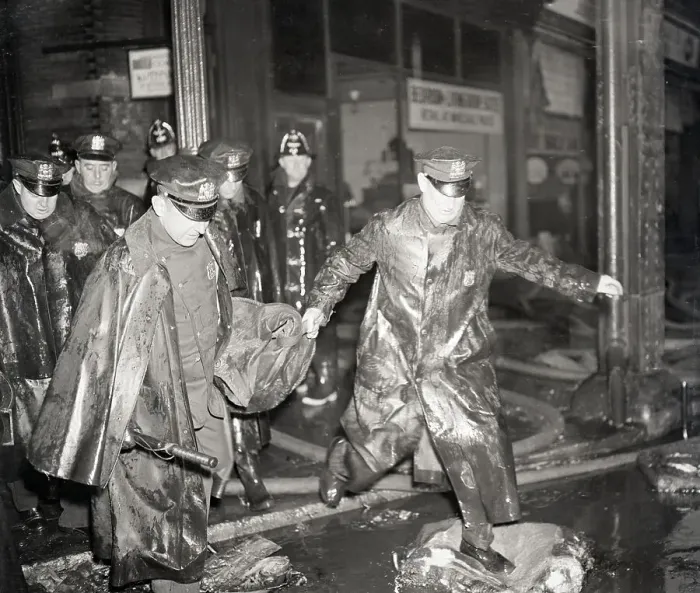 Framed Print : Policemen Carrying Body on Street Framed Print : Policemen Carrying Body on Street