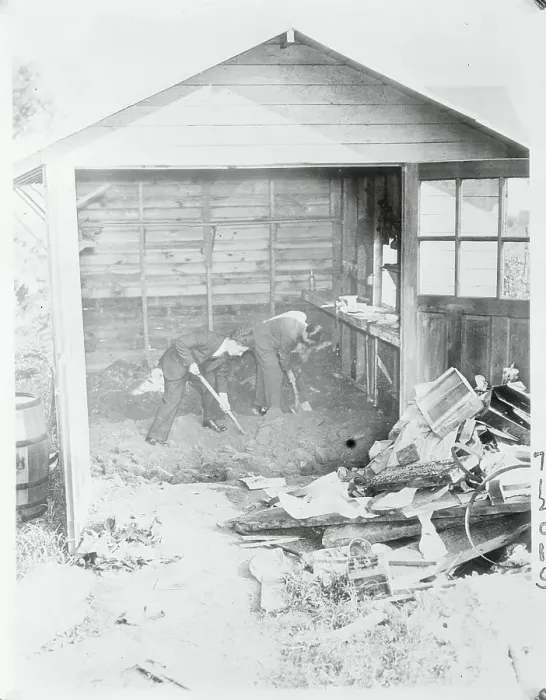 Framed Print : Policemen Digging in a Garage Framed Print : Policemen Digging in a Garage