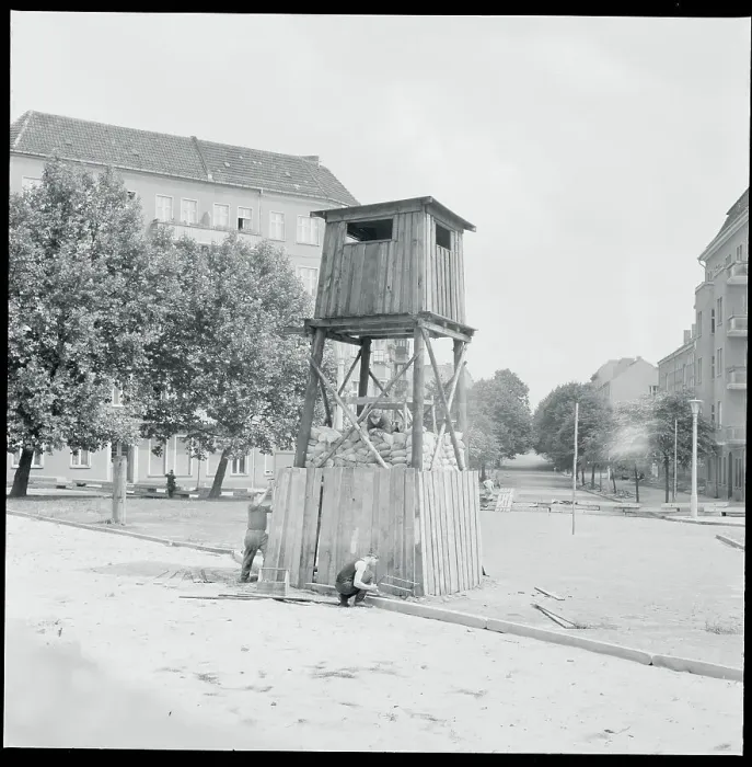 Framed Print : Policemen Fortifying a Lookout Tower Framed Print : Policemen Fortifying a Lookout Tower