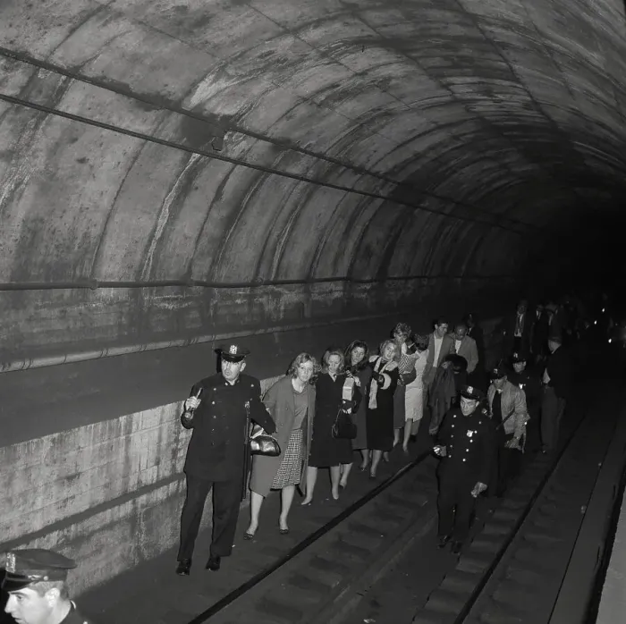 Framed Print : Policemen Leading Subway Passengers to Safety Framed Print : Policemen Leading Subway Passengers to Safety