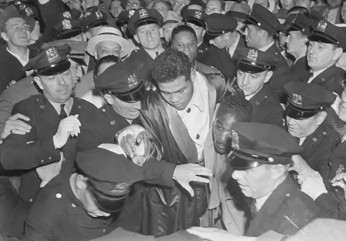Framed Print : Policemen Surrounding Joe Louis Framed Print : Policemen Surrounding Joe Louis