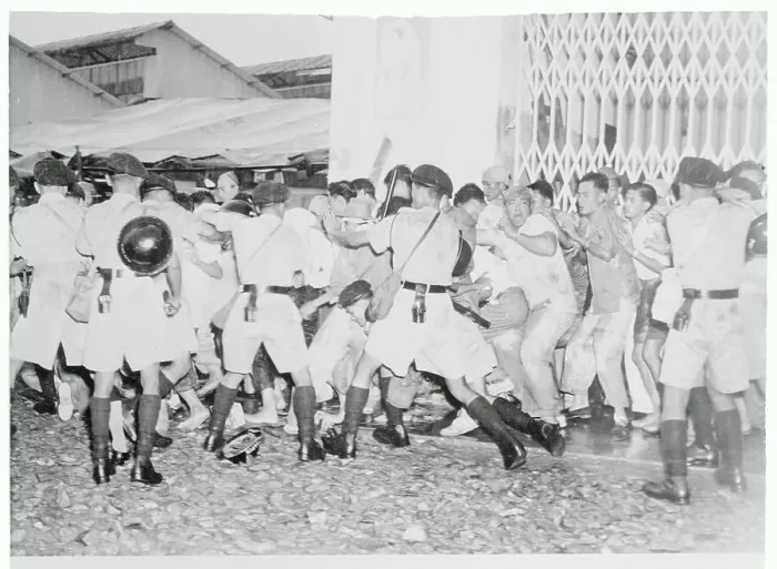 Framed Print : Policemen Trying to Control a Crowd Framed Print : Policemen Trying to Control a Crowd