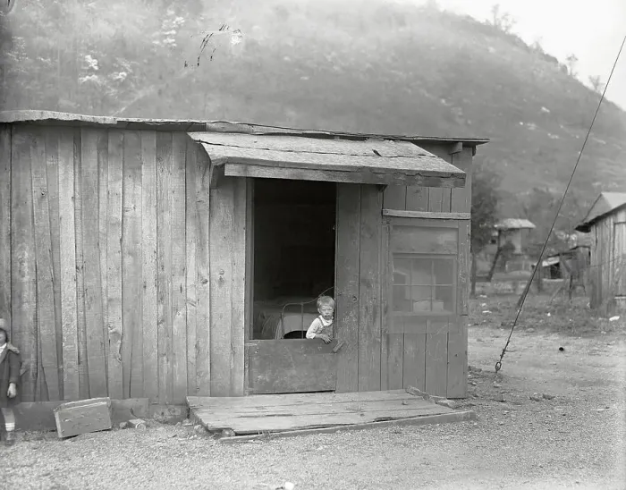 Framed Print : Poor Boy in Doorway of Mill Worker's Shack Framed Print : Poor Boy in Doorway of Mill Worker's Shack