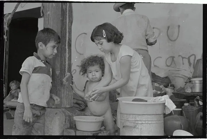 Framed Print : Poor Children in Dirty Clothes in Slum Site Framed Print : Poor Children in Dirty Clothes in Slum Site