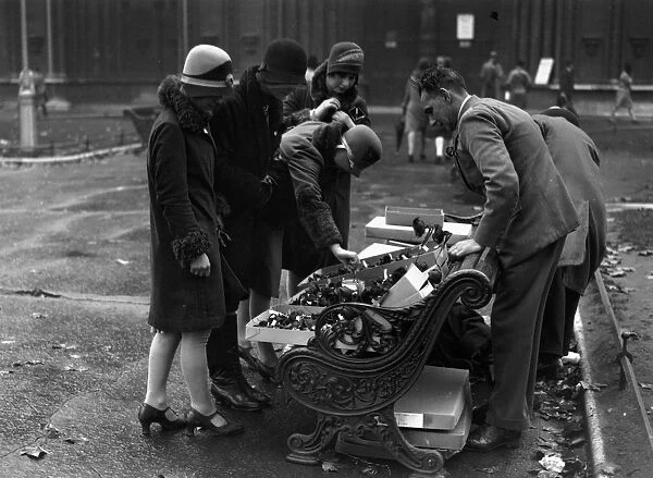 Poppy Day. 10th November 1929: Disabled ex-servicemen selling Flanders