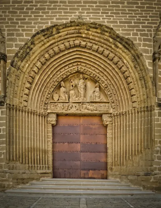 Framed Print : Portico of the church in the center of the city of Artajona in Spain Framed Print : Portico of the church in the center of the city of Artajona in Spain