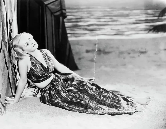 Framed Print : Portrait of Bette Davis Lounging in Beach Ensemble Framed Print : Portrait of Bette Davis Lounging in Beach Ensemble