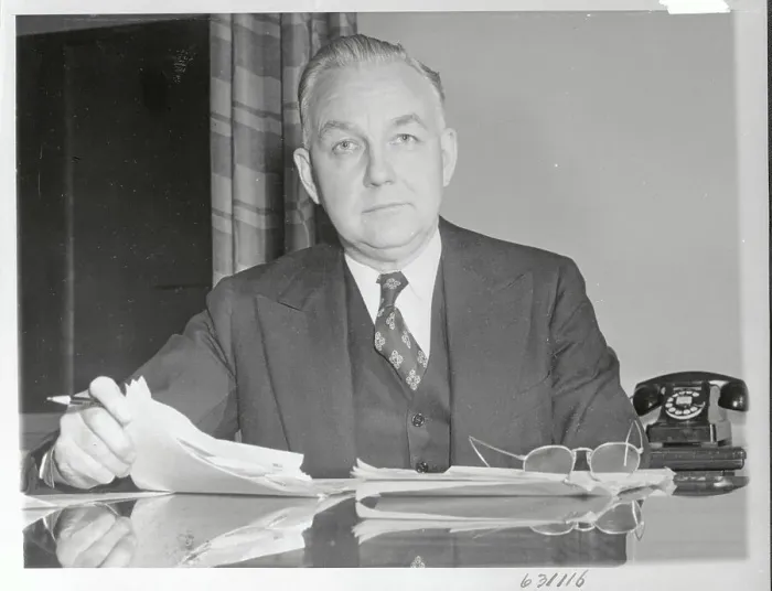 Framed Print : Portrait of Byron Price Sitting at His Desk Framed Print : Portrait of Byron Price Sitting at His Desk