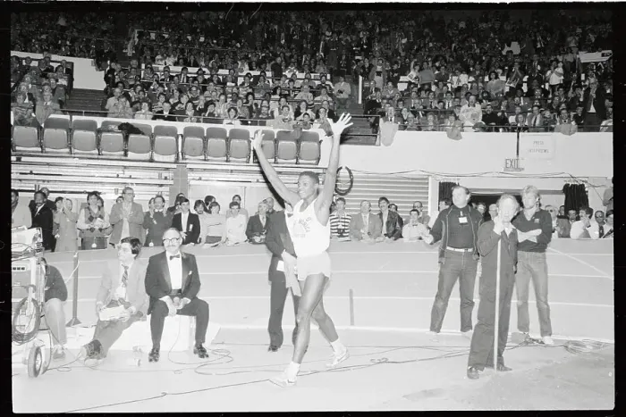 Framed Print : Portrait of Carl Lewis Raising Arms After Jump Framed Print : Portrait of Carl Lewis Raising Arms After Jump