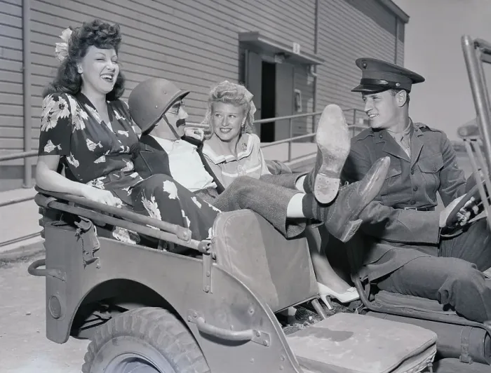 Framed Print : Portrait of Ginger Rogers and Others in Jeep