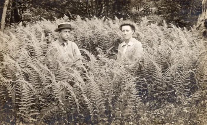 Framed Print : Portrait of a Serious Looking Couple Sitting in Fern Framed Print : Portrait of a Serious Looking Couple Sitting in Fern