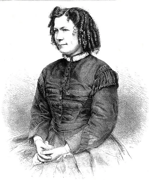 Portrait of senior woman, sitting, side view