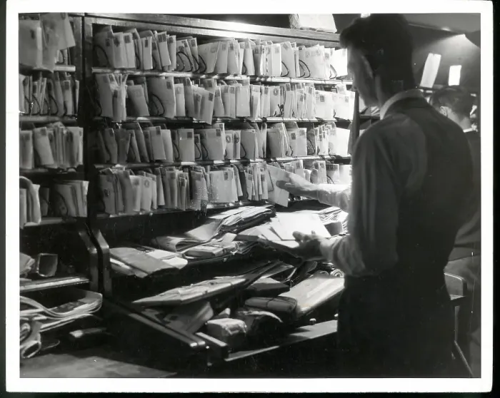 Framed Print : Postal Worker Sorting Mail Framed Print : Postal Worker Sorting Mail