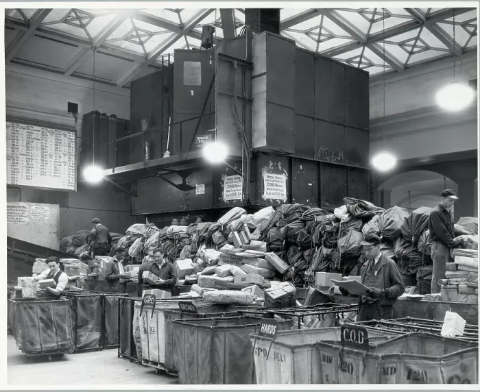 Framed Print : Postal Workers Sort Parcel Post Packages Framed Print : Postal Workers Sort Parcel Post Packages