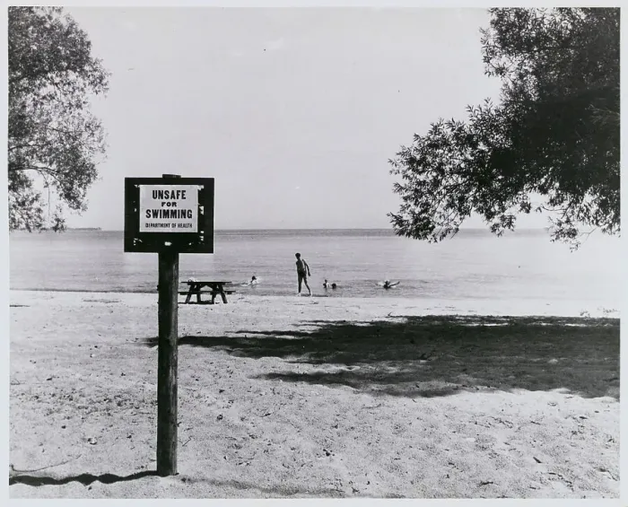 Framed Print : Posted Warning Sign at Sparsely Populated Beach Area Framed Print : Posted Warning Sign at Sparsely Populated Beach Area
