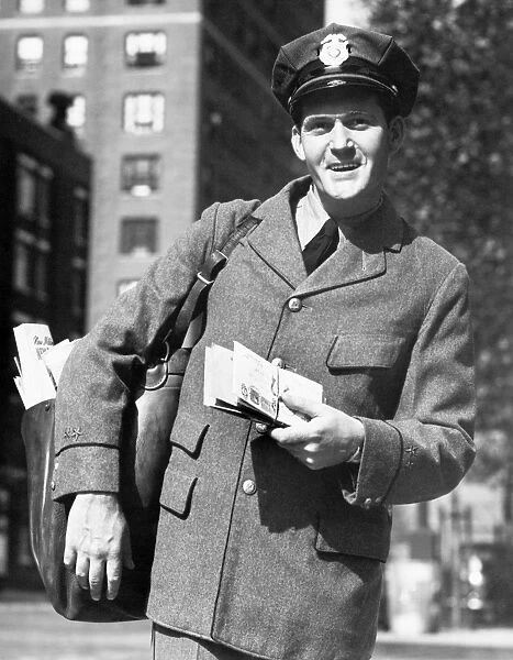 Postman in street, portrait