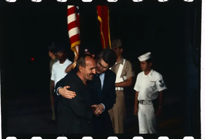 Framed Print : POW Richard Utech Being Greeted by Frank Sievert Framed Print : POW Richard Utech Being Greeted by Frank Sievert