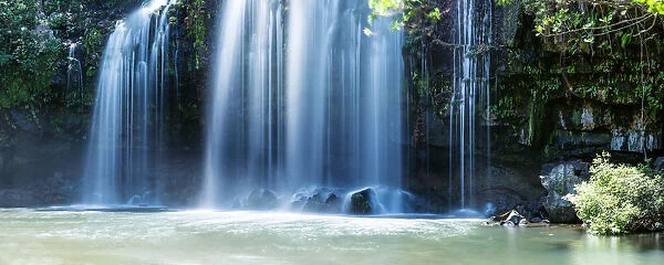 Powerful waterfall in the green forest of Costa Rica