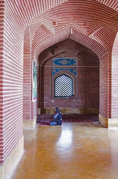 A prayer. Shah Jahan Mosque is located in Thatta, Sindh province, Pakistan