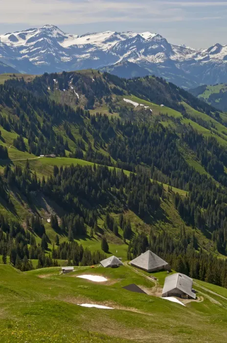 Framed Print : Pre-alpine landscape with alpine cabins, the snow-capped Bernese Alps at the back, near Ablandschen, Saanen, Canton of Bern, Switzerland Framed Print : Pre-alpine landscape with alpine cabins, the snow-capped Bernese Alps at the back, near Ablandschen, Saanen, Canton of Bern, Switzerland