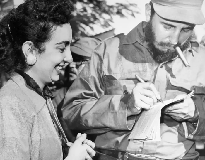Framed Print : Premier Fidel Castro Signing His Autograph for a Woman Framed Print : Premier Fidel Castro Signing His Autograph for a Woman