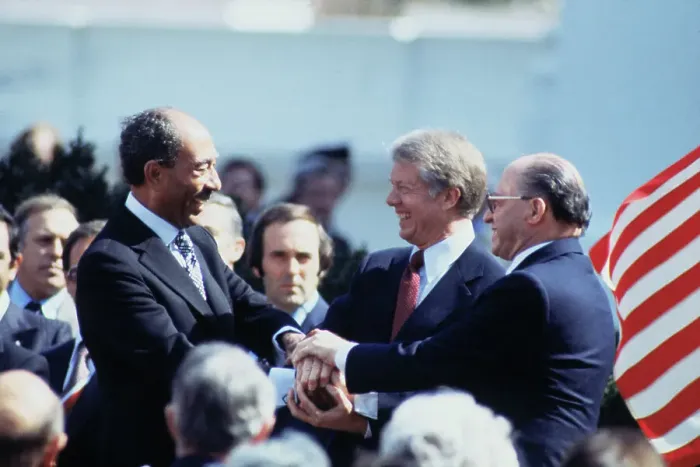Framed Print : President Carter, Anwar Sadat and Menachem Begin in Three Way Handshake Framed Print : President Carter, Anwar Sadat and Menachem Begin in Three Way Handshake