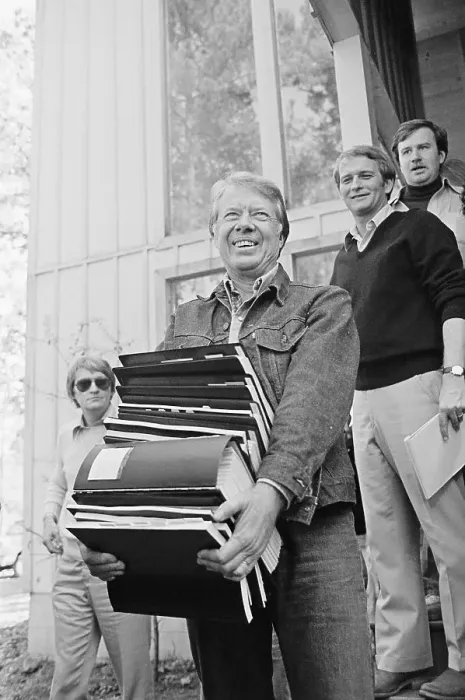 Framed Print : President-Elect Carter Carries Books Framed Print : President-Elect Carter Carries Books