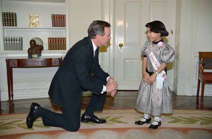 Framed Print : President George Bush Chatting with Easter Seal Child Framed Print : President George Bush Chatting with Easter Seal Child