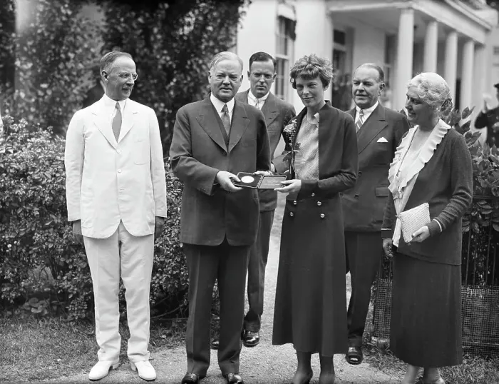 Framed Print : President Hoover Giving Medal to Amelia Earhart Framed Print : President Hoover Giving Medal to Amelia Earhart