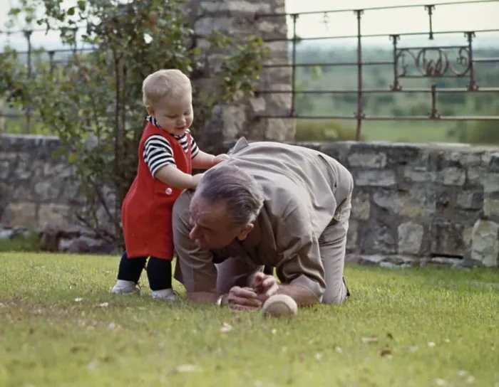 Framed Print : President Johnson Playing With Grandson Framed Print : President Johnson Playing With Grandson