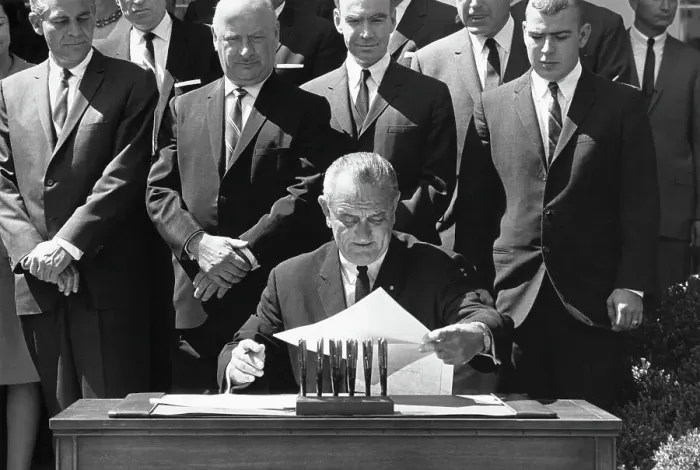 Framed Print : President Johnson Signing Documents Framed Print : President Johnson Signing Documents
