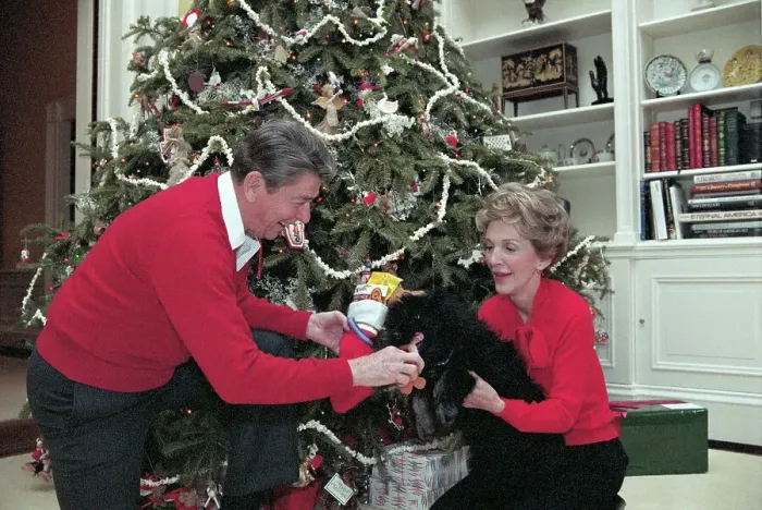 Framed Print : President and Nancy Reagan Playing with Their Puppy