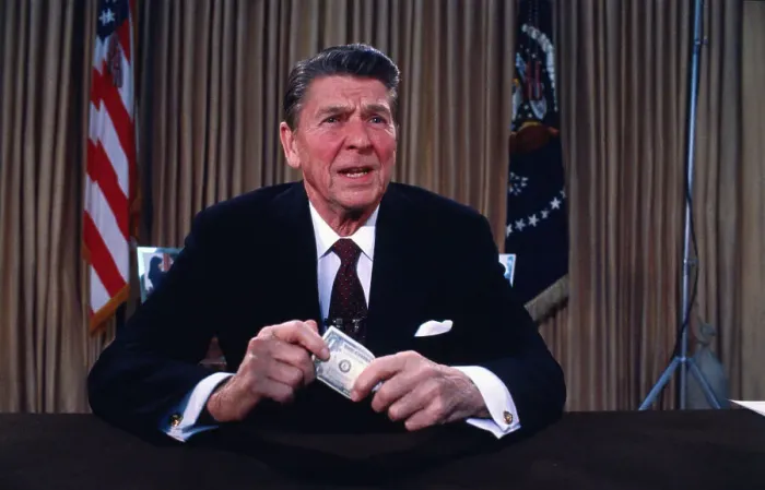 Framed Print : President Reagan Holding a Dollar Bill Framed Print : President Reagan Holding a Dollar Bill