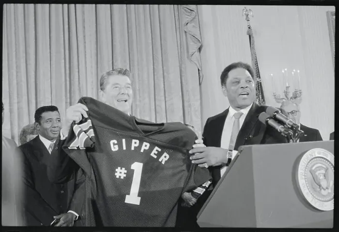 Framed Print : President Reagan Holding a Shirt