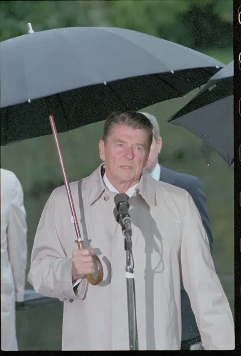 Framed Print : President Reagan Holding an Umbrella Framed Print : President Reagan Holding an Umbrella