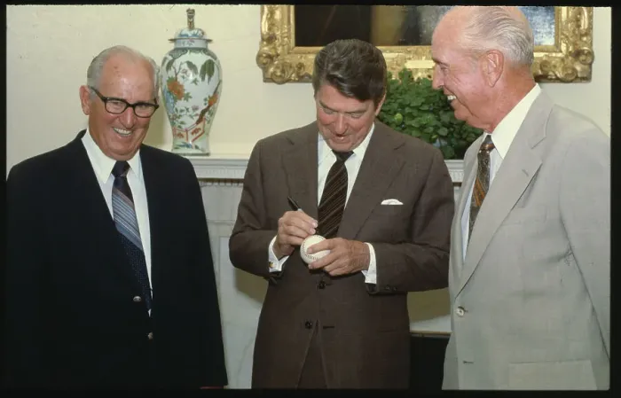 Framed Print : President Reagan Signing a Baseball Framed Print : President Reagan Signing a Baseball