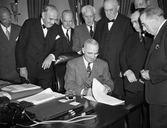 Framed Print : President Truman Signing a Foreign Aid Bill Framed Print : President Truman Signing a Foreign Aid Bill