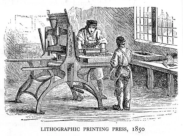Press Men. circa 1850: Two men work at a lithographic printing press