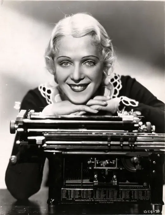 Framed Print : Pretty Blonde Leaning On Typewriter Framed Print : Pretty Blonde Leaning On Typewriter