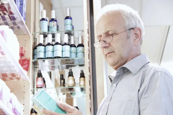 Framed Print : Prices comparison in a pharmacy Framed Print : Prices comparison in a pharmacy